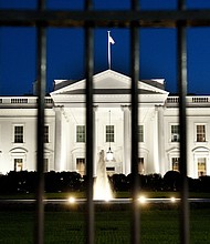 The White House is seen at dusk on the eve of a possible government shutdown as Congress battles out the budget in Washington, DC, September 30, 2013./Credit:	Saul Loeb/AFP/Getty Images