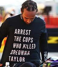 Lewis Hamilton wears a shirt in tribute to Taylor during a GP on September 13, 2020./Credit:	Bryn Lennon/Getty Images Europe/Getty Images