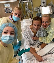 "Hi, this is Navalny," the opposition leader wrote in the caption to the picture he posted on Instagram. The photo showed Navalny with his daughter Daria, son Zahar and wife Yulia.
Credit:	Alexey Navalny/Instagram