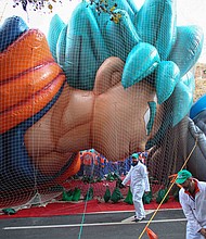 Revelers get ready before the annual Macys' Thanksgiving parade on November 28, 2019 in New York City./Credit:	Kena Betancur/Getty Images