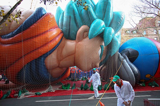 Revelers get ready before the annual Macys' Thanksgiving parade on November 28, 2019 in New York City./Credit:	Kena Betancur/Getty Images