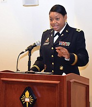 Col. Monica R. Lawson addresses family and friends during her historic promotion ceremony Sept. 2 at Fort Jackson in Columbia, S.C.