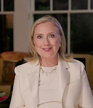 Hillary Clinton's forthcoming podcast will be released later this month and focus on everything from ongoing political issues to popular culture to the coronavirus pandemic./Credit: DNC/Getty Images