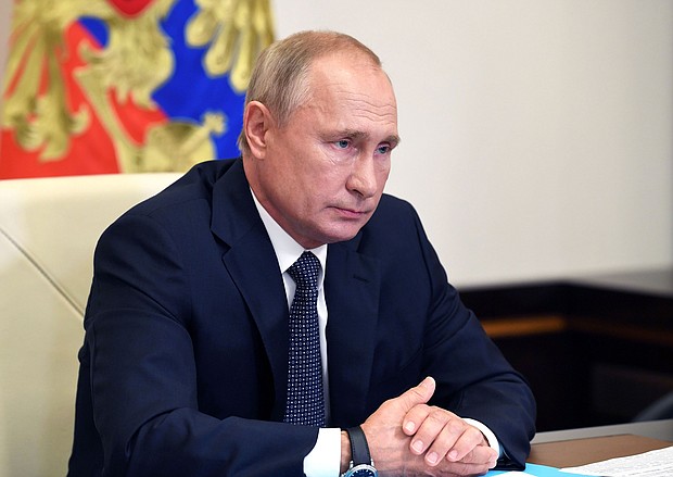 The CIA assessed in August that Russian President Vladimir Putin and his top aides "are aware of and probably directing Russia's influence operations" aimed at undermining Democratic presidential candidate Joe Biden in the 2020 election, according to a new report in The Washington Post./Credit: Alexey Nikolsky/Sputnik/AFP/Getty Image