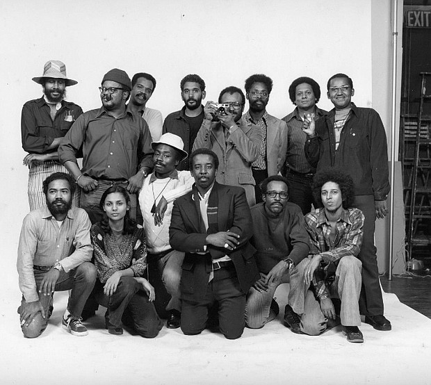 Henrico native Louis Draper, kneeling center, poses with fellow photographers in this Kamoinge group portrait from 1973 by Anthony Barboza.