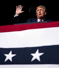 President Donald Trump speaks at a campaign rally on September 25, 2020, in Newport News, Virginia./Credit:	Evan Vucci/AP