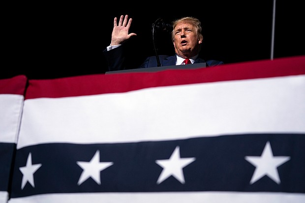 President Donald Trump speaks at a campaign rally on September 25, 2020, in Newport News, Virginia./Credit:	Evan Vucci/AP
