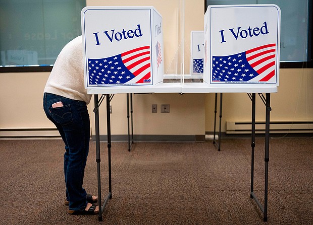 Voters cast their ballots for the 2020 election at an early, in-person voting location in Arlington, Virginia, on September 18, 2020./Credit:	Andrew Caballero-Reynolds/AFP/Getty Images