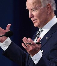 Democratic Presidential candidate and former Vice President Joe Biden speaks during the first presidential debate at Case Western Reserve University and Cleveland Clinic in Cleveland, Ohio, on September 29, 2020./Credit:	Saul Loeb/AFP/Getty Images