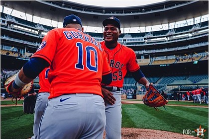 Pitcher Framber Valdez shares a moment with first baseman Yuli Gurriel after the win on Tuesday. Photo Credit/Houston Astros