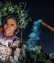 Protesters march against police brutality in Los Angeles, on September 23, 2020, following a decision on the Breonna Taylor case in Louisville, Kentucky./Credit:	Apu Gomes/AFP/Getty Images