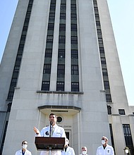 White House physician Sean Conley (C) answers questions surrounded by other doctors, during an update on the condition of President Donald Trump, on October 4, 2020, at Walter Reed Medical Center in Bethesda, Maryland.
Credit:	Brendan Smialowski/AFP/Getty Images
