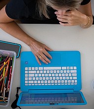 Hundreds of thousands of women — nearly eight times more than the number of men — dropped out of the US labor force last month, as the pandemic continues to exacerbate inequalities in America's economy.
Credit:	Jayme Gershen/Bloomberg/Getty Images