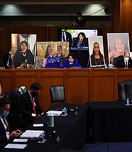 Poster boards of people who may lose their health insurance if the Affordable Care Act is repealed are set up prior to start of the Senate Judiciary Committee confirmation hearing for Supreme Court Justice on Capitol Hill on October 12, 2020 in Washington, DC.
Credit:	Kevin Dietsch/Pool/Getty Images