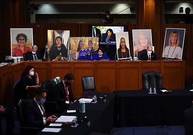 Poster boards of people who may lose their health insurance if the Affordable Care Act is repealed are set up prior to start of the Senate Judiciary Committee confirmation hearing for Supreme Court Justice on Capitol Hill on October 12, 2020 in Washington, DC.
Credit:	Kevin Dietsch/Pool/Getty Images