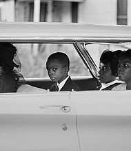 Ben Chaney, center, in the car on the way to his brother's funeral, August 1964, Mississippi.
Credit:	Bill Eppridge/PBS