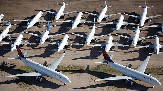 Decommissioned and suspended Delta and jetBlue commercial aircrafts are seen stored in Pinal Airpark on May 16, 2020 in Marana, Arizona.
Credit:	Christian Petersen/Getty Images