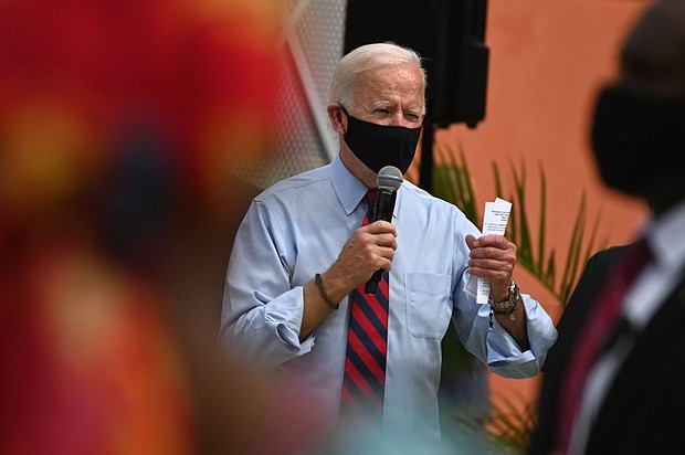 Democratic presidential nominee and former Vice President Joe Biden speaks at the Little Haiti Cultural Complex in Miami, Florida on October 5, 2020.
Credit:	Roberto Schmidt/AFP/Getty Images