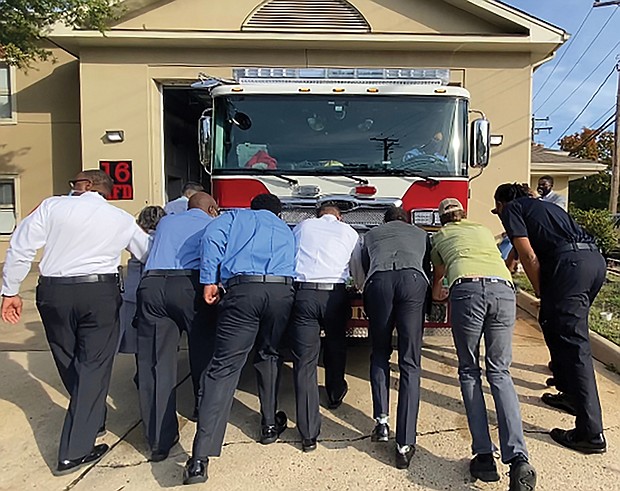 City leaders and community members take part in a “Push In” ceremony to put a new fire engine in service at Fire Station 16. Location: 3901 Cham- berlayne Ave. Among the participants at the Oct. 9 event are Mayor Levar M. Stoney and Richmond Fire Chief Melvin Carter. Four other stations around the city also are planning similar ceremonies when their new trucks arrive.