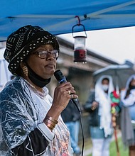 Pamela Bingham, a descendant of Mr. Prosser, speaks at the gathering that aimed to educate people about the past and to update people on the progress of the memorial to the enslaved that
is planned for the site at 15th and Broad streets. The site once contained the African Burial Ground and the city gallows, where members of the revolt, including Gabriel, were hanged.