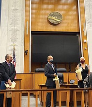 Mayor Levar M. Stoney, front center, talks with special guests at a ceremony Oct. 9 in Richmond City Council Chambers proclaiming Monday, Oct. 12, as Indigenous Peoples’ Day in the city.
This is the second year the city has honored the day, which was formerly dedicated to Christopher Columbus, who many view as exploiting indigenous people.
In June, a statue of Columbus was pulled down from its perch in Byrd Park by protesters and dragged into Fountain Lake. The city now has the statue in storage.
Guests at the ceremony are, from left, Keith Anderson of Portsmouth and Chief Samuel Bass of Suffolk, both of the Nansemond Indian Nation; Reggie Tupponce Jr. of Glen Allen, administrator of the Upper Mattaponi Indian Tribe; Shereen Waterlily of Richmond, a representative of the Mattaponi Tribe; Dr. Denise L. Walters of Henrico, a member of the Nottoway Tribe Council; and Pamunkey Chief Robert Gray of King William County.
Monday also was proclaimed Indigenous Peoples’ Day in Virginia for the first time. In a statement, Gov. Northam said the state and the nation “too often failed to live up to our commitments with those who were the first stewards of the lands we now call Virginia — and they have suffered historic injustices as a result.
“Indigenous Peoples’ Day celebrates the resilience of our tribal communities and promotes reconciliation, healing, and continued friendship with Virginia’s Indian tribes,” the statement continued.
“In making this proclamation, we pay tribute to the culture, history, and many contributions of Virginia Indians and recommit to cultivating strong government-to-government partnerships that are grounded in mutual trust and respect.” Virginia is home to 11 state-recognized Indian tribes, seven of which also are federally recognized.