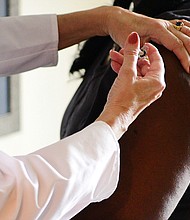 Once a Covid-19 vaccine becomes available in the United States, the Centers for Disease Control and Prevention plans to monitor vaccine recipients for any health problems through text messages and online surveys, as part of a new program called V-SAFE.
Credit:	Johnson & Johnson/AP/FILE