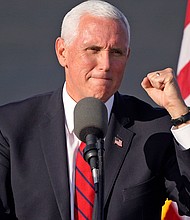 Pence skips public health recommended self-quarantine but does change plans after staff outbreak.
Credit:	Gene J. Puskar/AP