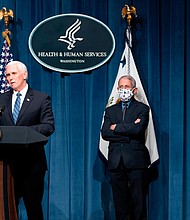 Pence's office says he did not attend Amy Coney Barrett's swearing-in due to CDC guidelines.
Credit:	Joshua Roberts/Getty Images North America/Getty Images