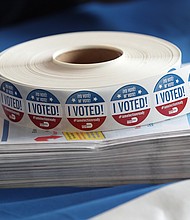 I voted stickers are seen as people drop off their Vote-by Mail ballots at the Miami-Dade Election Department headquarters.
Credit:	Joe Raedle/Getty Images