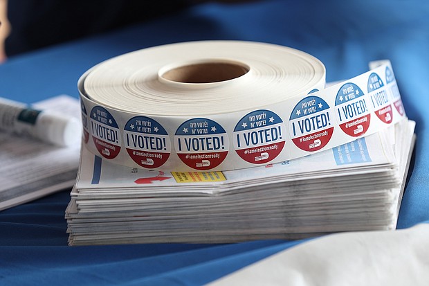 I voted stickers are seen as people drop off their Vote-by Mail ballots at the Miami-Dade Election Department headquarters.
Credit:	Joe Raedle/Getty Images