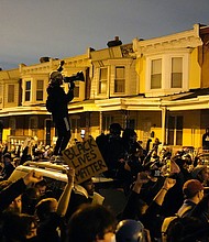 Hundreds of demonstrators marched in West Philadelphia over the death of Walter Wallace Jr., a Black man killed by police in Philadelphia on Oct. 26.
Credit:	Matt Slocum/AP
