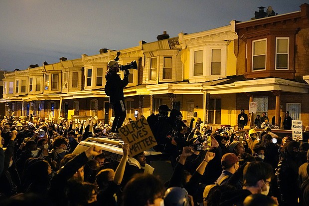 Hundreds of demonstrators marched in West Philadelphia over the death of Walter Wallace Jr., a Black man killed by police in Philadelphia on Oct. 26.
Credit:	Matt Slocum/AP