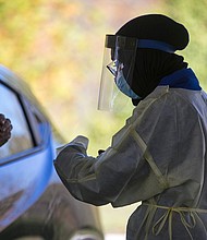 In just a week, the fall coronavirus surge added nearly half a million cases to the US total.
Credit:	Liz Dufour/The Enquirer/Imagn/USA Today