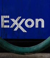ExxonMobil is cutting jobs at home and overseas as oil prices tumble on coronavirus fears.
Credit:	Callaghan O'Hare/Bloomberg via Getty Images