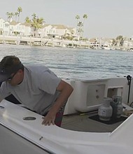 Boater, Trent Mcwhinney, on a boat following the rescue of two children and four adults who were injured in an explosion on November 1, 2020, in Huntington Beach./Credit:	KCAL/KCBS