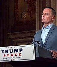 Richard Grenell, President Donald Trump's former ambassador to Germany and former acting director of national intelligence, tweeted two photos side by side: one of former Vice President Joe Biden standing on an airplane without a mask and one of Biden standing outdoors while wearing a mask./Credit:	RNC