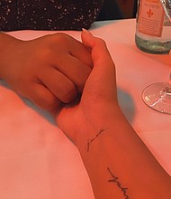 Chrissy Teigen honors her late son with a new tattoo of his name./Credit:	From Chrissy Teigen/Twitter