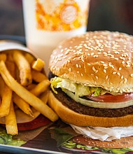 In this photo illustration, an 'Impossible Whopper' sits on a table at a Burger King restaurant on April 1, 2019 in Richmond Heights, Missouri.
Credit:	Michael Thomas/Getty Images