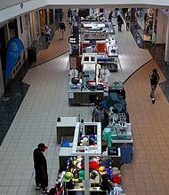 Patrons walk around Arbor Place Mall on May 04, 2020 in Douglasville, Georgia. Arbor Place reopened for business on May 1 under strict guidelines due to the coronavirus pandemic./Credit:	Kevin C. Cox/Getty Images