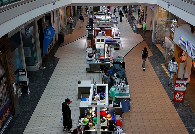 Patrons walk around Arbor Place Mall on May 04, 2020 in Douglasville, Georgia. Arbor Place reopened for business on May 1 under strict guidelines due to the coronavirus pandemic./Credit:	Kevin C. Cox/Getty Images