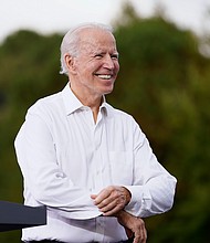 Democratic presidential candidate former Vice President Joe Biden arrives to speak at a drive-in rally at Cellairis Amphitheatre in Atlanta on Oct. 27, 2020./Credit:	Andrew Harnik/AP