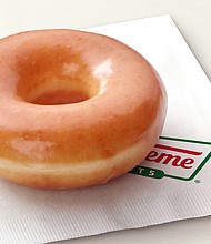 Caption:	Visitors to Krispy Kreme with an "I Voted" sticker get a free glazed doughnut on Election Day./Credit:	Krispy Kreme