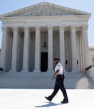 The US Supreme Court is seen in Washington, DC, on May 4, 2020, during the first day of oral arguments held by telephone, a first in the Court's history, as a result of COVID-19, known as coronavirus./Credit:	Saul Loeb/AFP/Getty Images