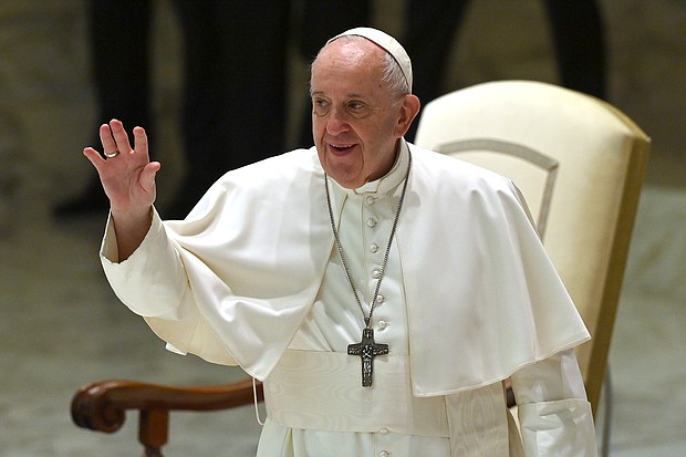 Pope Francis waves during his weekly general audience in the Paul VI hall at the Vatican on October 14, 2020./Credit:	ALBERTO PIZZOLI/AFP/AFP via Getty Images