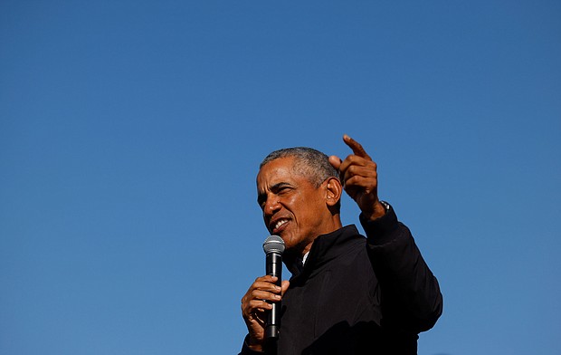 Former U.S. President Barack Obama gestures as he speaks at a democratic U.S. presidential nominee and former Vice President Joe Biden's campaign drive-in, mobilization event in Flint, Michigan on October 31, 2020.
Credit:	Brian Snyder/Reuters