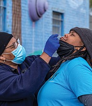 With the current global health crisis and its disproportionate impact on the Black and brown community, free COVID-19 testing also was available at the Black Coalition of Change Justice Rally to Unify and Empower the Black Community. Cherrie McLean takes a nasal swab from an attendee during the testing.