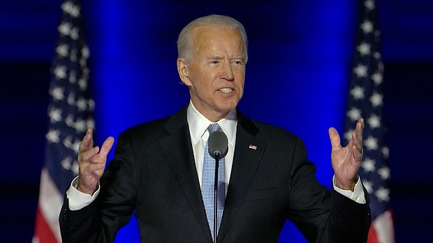 President-elect Joe Biden delivers remarks during his victory speech in Wilmington, Delaware on Nov. 7.
Credit:	POOL
