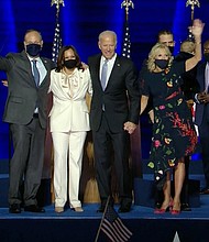 President-elect Joe Biden and Vice President-elect Kamala Harris were joined on stage following their speeches in Wilmington, Delaware, tonight by their families.
Credit:	POOL