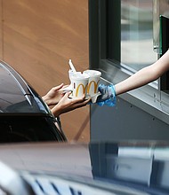 McDonald's plan to boost sales includes launching a new crispy chicken sandwich and improving its drive-thru and delivery services.
Credit: Cameron Smith/Getty Images