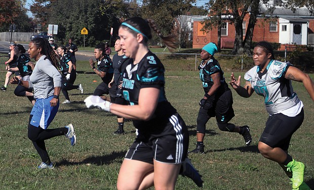 Women run through a series of drills last Saturday during tryouts for the River City Sting women’s full tackle football team. The tryouts, held at Montrose Elementary School in Eastern Henrico, will continue for the next two Saturdays, with the team scheduled to begin playing in the spring.